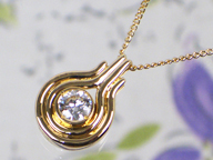 K18YGダイヤモンドデザインペンダントネックレス 0.18ct